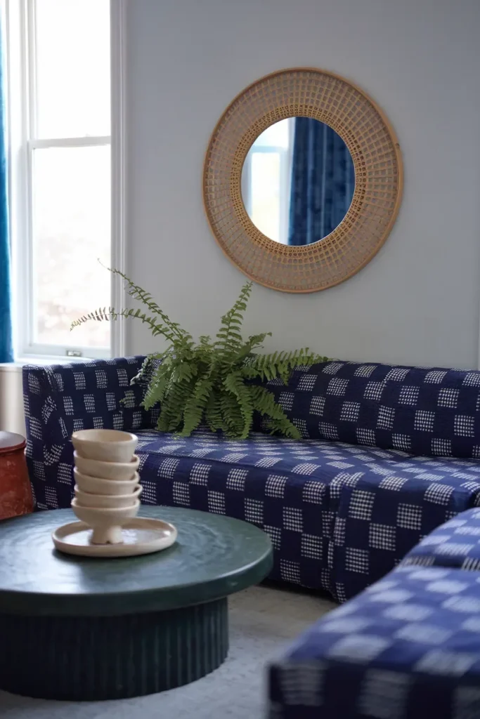 grandmillennial living room indigo block print sofa cane mirror