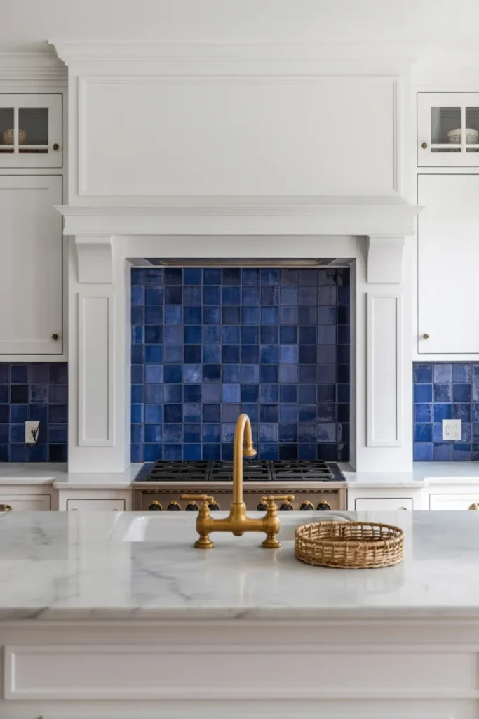 white kitchen cobalt tile backsplash brass faucet